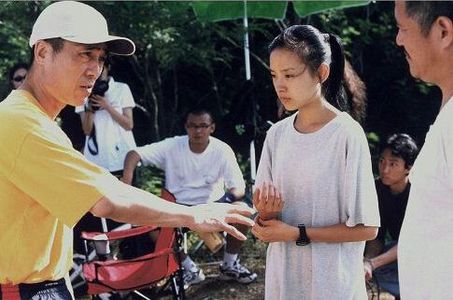 Yimou Zhang, Benshan Zhao, and Dong Jie in Happy Times (2000)