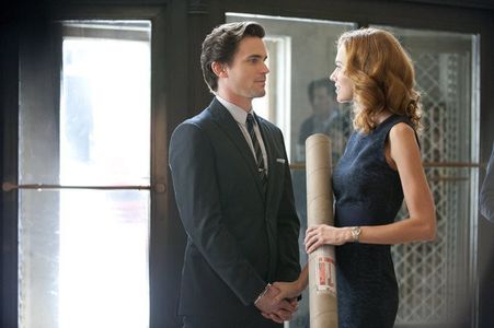 Matt Bomer and Hilarie Burton in White Collar (2009)