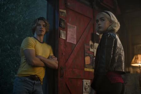 Sam Corlett and Kiernan Shipka in The Chilling Adventures of Sabrina