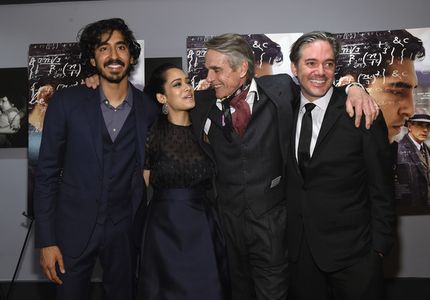 (L-R) Dev Patel, Devika Bhise, Jeremy Irons, and Matthew Brown attend 