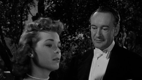 George Sanders and Nancy Gates in Death of a Scoundrel (1956)