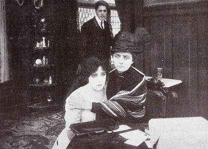 Carlyle Blackwell, Lillian Christy, and Jane Wolfe in The Village Vixen (1912)