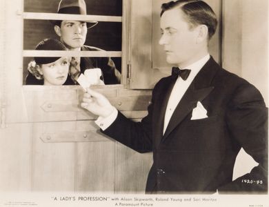 Roscoe Karns, Sari Maritza, and Kent Taylor in A Lady's Profession (1933)