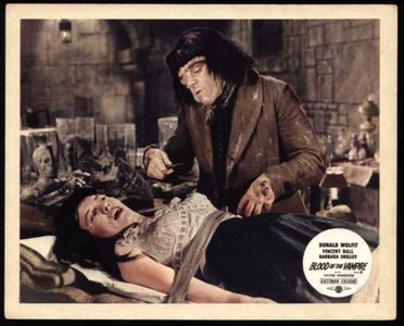 Barbara Burke and Victor Maddern in Blood of the Vampire (1958)