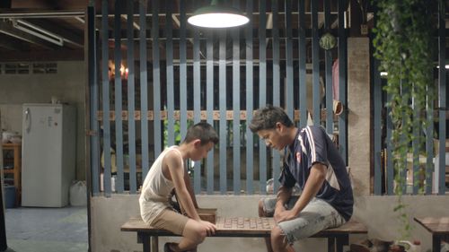 Thira Chutikul and Ingkarat Damrongsakkul in How to Win at Checkers (Every Time) (2015)