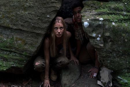 Adain Bradley and Charlotte Vega in Wrong Turn (2021)