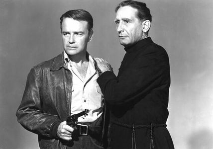 Lew Ayres and Victor Jory in The Capture (1950)