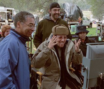 Cinematographer Remi Adefarasin (front left) and director Rob Minkoff (front center) with producer Don Hahn (rear center