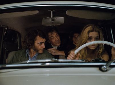 Joaquin Phoenix, Martin Short, Sasha Pieterse, and Jordan Christian Hearn in Inherent Vice (2014)