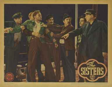 Errol Flynn, Stanley Fields, Frank Otto, and Harry Semels in The Sisters (1938)