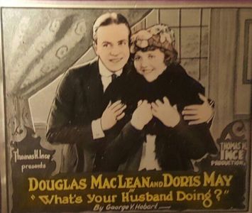 Douglas MacLean and Doris May in What's Your Husband Doing? (1920)