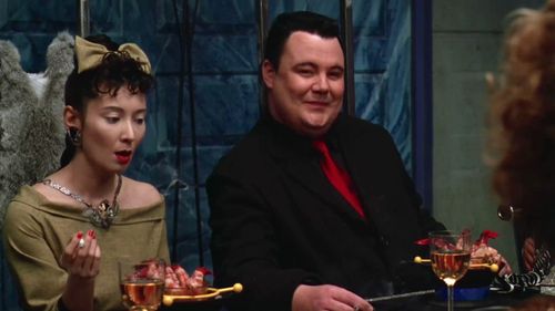 Adelle Lutz and Glenn Shadix in Beetlejuice (1988)