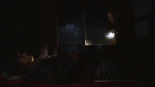 Jung Suh and Yu-seok Kim in The Isle (2000)