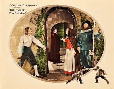 Douglas Fairbanks, Marguerite De La Motte, and Thomas Holding in The Three Musketeers (1921)