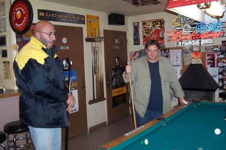 Between takes, Producer Kenny Saylors and Actor Sid Haig play a round of billiards.