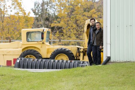 Michael Irby and Clive Standen in Taken (2017)