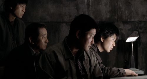 Song Kang-ho, Kim Sang-kyung, and Roe-ha Kim in Memories of Murder (2003)