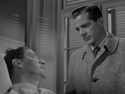 Dana Andrews and Joseph Forte in Assignment: Paris (1952)