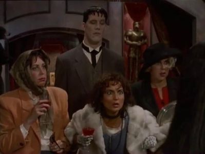 Melanie Angel, John DeSantis, Tasha Lee Moth, and Michelle Brezinski in The New Addams Family (1998)