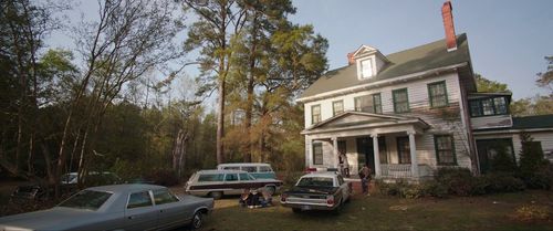 Vera Farmiga, Patrick Wilson, John Brotherton, and Shannon Kook in The Conjuring (2013)