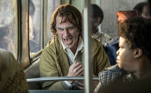 Joaquin Phoenix and Mandela Bellamy in Joker (2019)