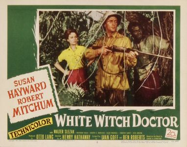 Robert Mitchum, Susan Hayward, and Mashood Ajala in White Witch Doctor (1953)