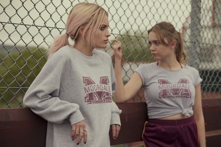 Aimee Lou Wood and Emma Mackey in Sex Education (2019)