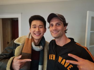 Actor Sam Song Li (left) and producer Mark Heidelberger on the set of feature film 