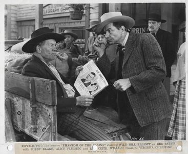 Tom London, Earle Hodgins, Rose Plumer, and Allen D. Sewall in Phantom of the Plains (1945)