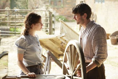 Michiel Huisman and Lily James in The Guernsey Literary and Potato Peel Pie Society (2018)