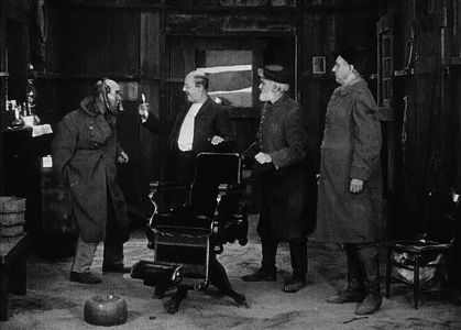 Harvey Clark, J. Farrell MacDonald, Francis Powers, and Jim Welch in The Iron Horse (1924)