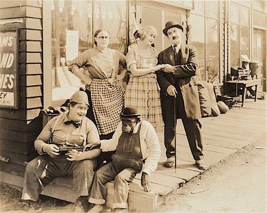 Lillian Biron, Hilliard Karr, Dorothy Vernon, and Little Napoleon in A Small Town Hero (1922)