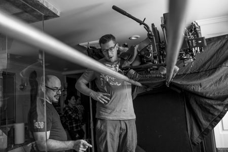 Jason and his cinematographer, Pascal Combes-Knoke discussing the bathtub overhead shot on the set of Uh Oh