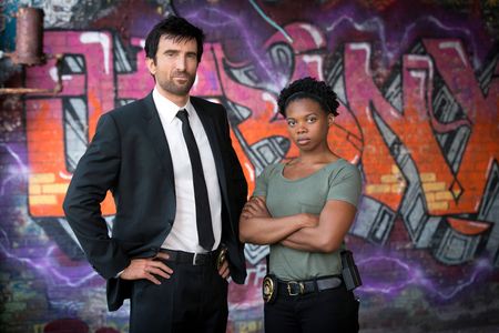 Sharlto Copley and Susan Heyward in Powers (2015)