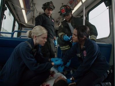 Lauren German, Charlie Barnett, Monica Raymund, and Joe Minoso in Chicago Fire (2012)