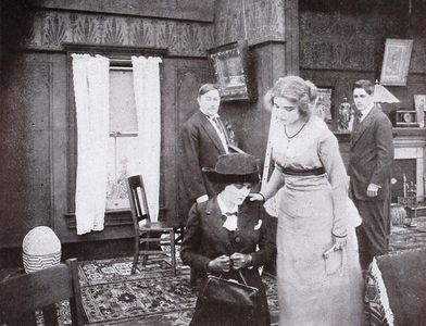 Carlyle Blackwell, Alice Joyce, William H. West, and Jane Wolfe in Freed from Suspicion (1912)