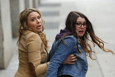 Sharknado 2 still - Courtney Baxter, Kari Wuhrer