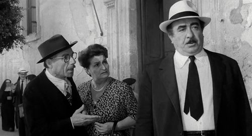 Lola Braccini, Rocco D'Assunta, and Saro Urzì in Seduced and Abandoned (1964)