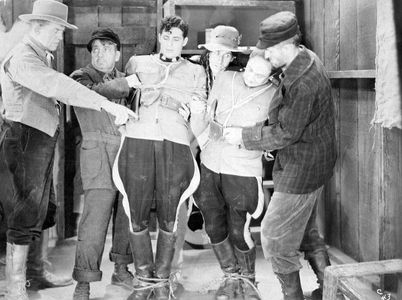 Jimmy Aubrey, Bob Card, Tom London, John Preston, and James Sheridan in Courage of the North (1935)