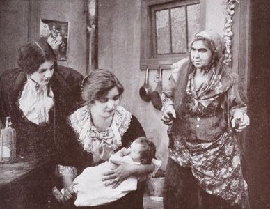 Alice Joyce, Laura La Varnie, and Hazel Neason in The Nurse at Mulberry Bend (1913)