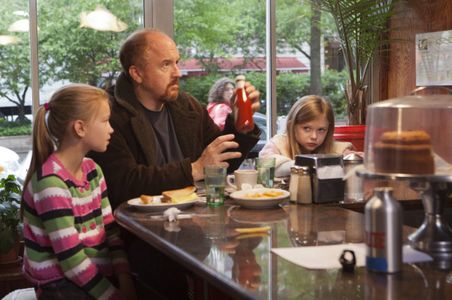 Louis C.K., Ursula Parker, and Hadley Delany in Louie (2010)