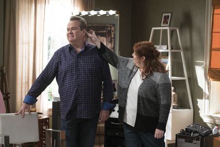 Eric Stonestreet and Dana Powell in Modern Family (2009)