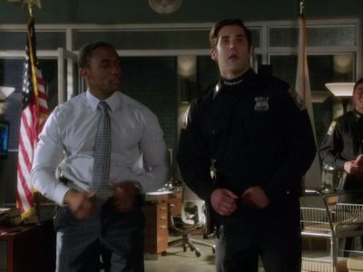 Jordan Bridges and Lee Thompson Young in Rizzoli & Isles (2010)