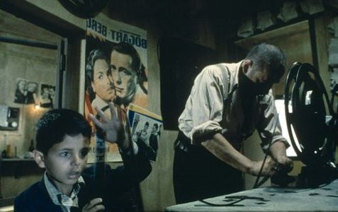 Salvatore Cascio and Philippe Noiret in Cinema Paradiso (1988)