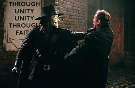 Alister Mazzotti and Hugo Weaving in V for Vendetta (2005)