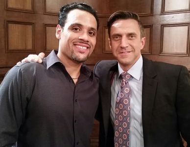 Gabriel Ellis as Diego Perez and Raúl Esparza as Rafael Barba on the set of Law & Order SVU. 