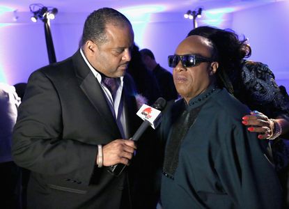 Stevie Wonder and Roland Martin