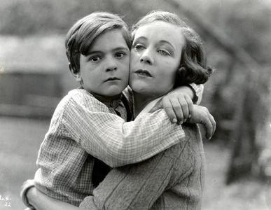 Frankie Darro and Virginia Valli in Judgment of the Hills (1927)