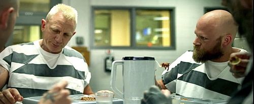 Edward Gelhaus and Daniel Craig in Logan Lucky