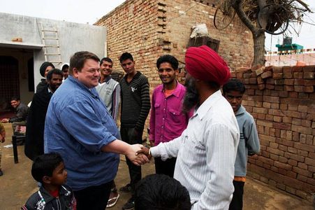 Kenny Saylors greeting locals while filming 